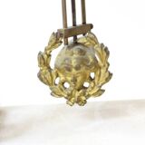 Clock and pair of Louis XVI style candelabras.