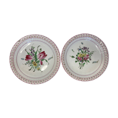 Lunéville, two floral earthenware bowls with pierced edges from the early 20th century.