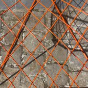 Orange lattice armchair