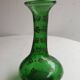 Green blown glass vase from the early 20th century.