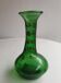 Green blown glass vase from the early 20th century.