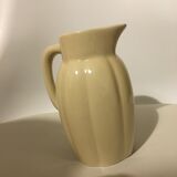 Cream color earthenware pitcher