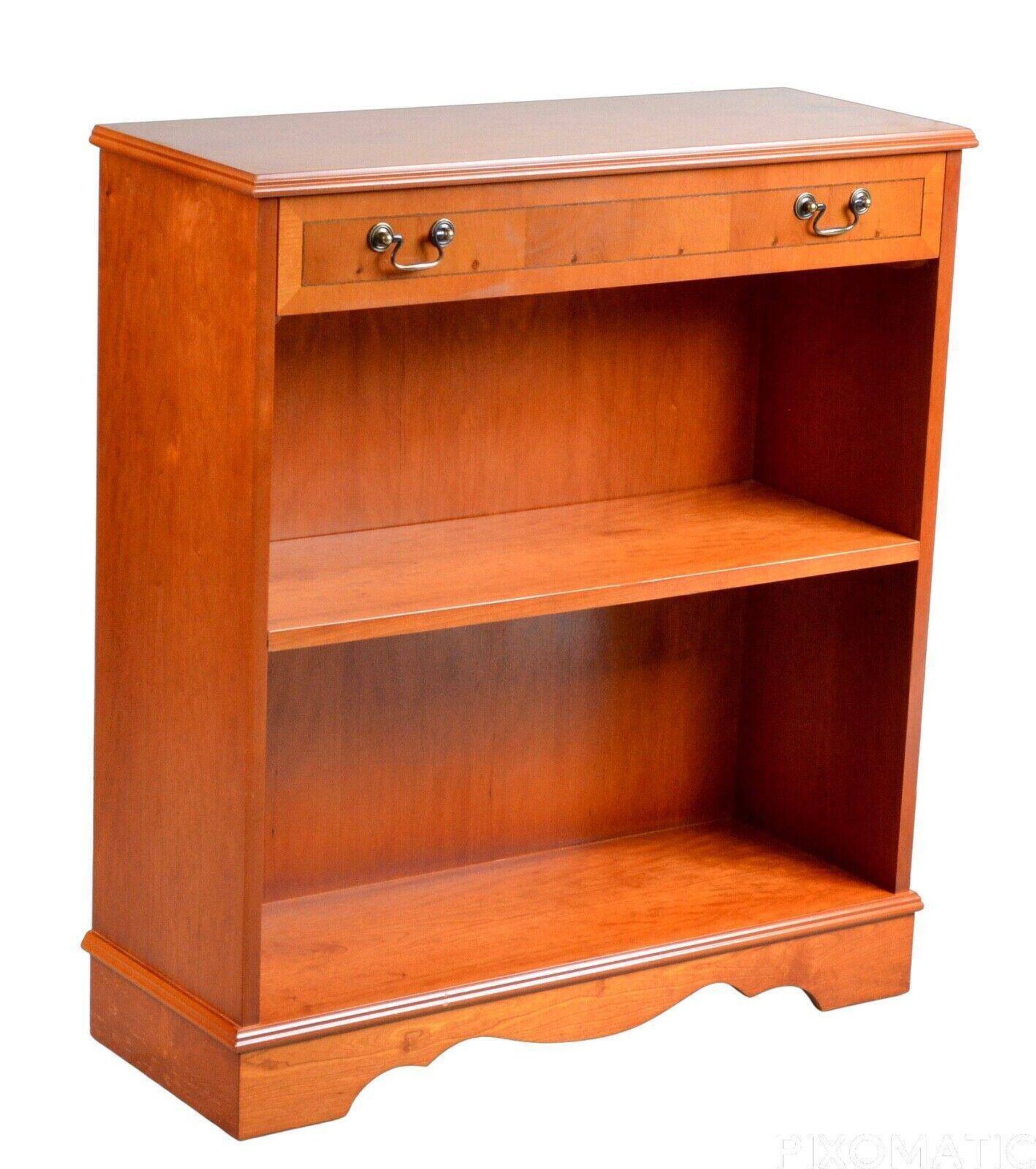 Pair of light walnut bookshelves with inlays and adjustable shelves.