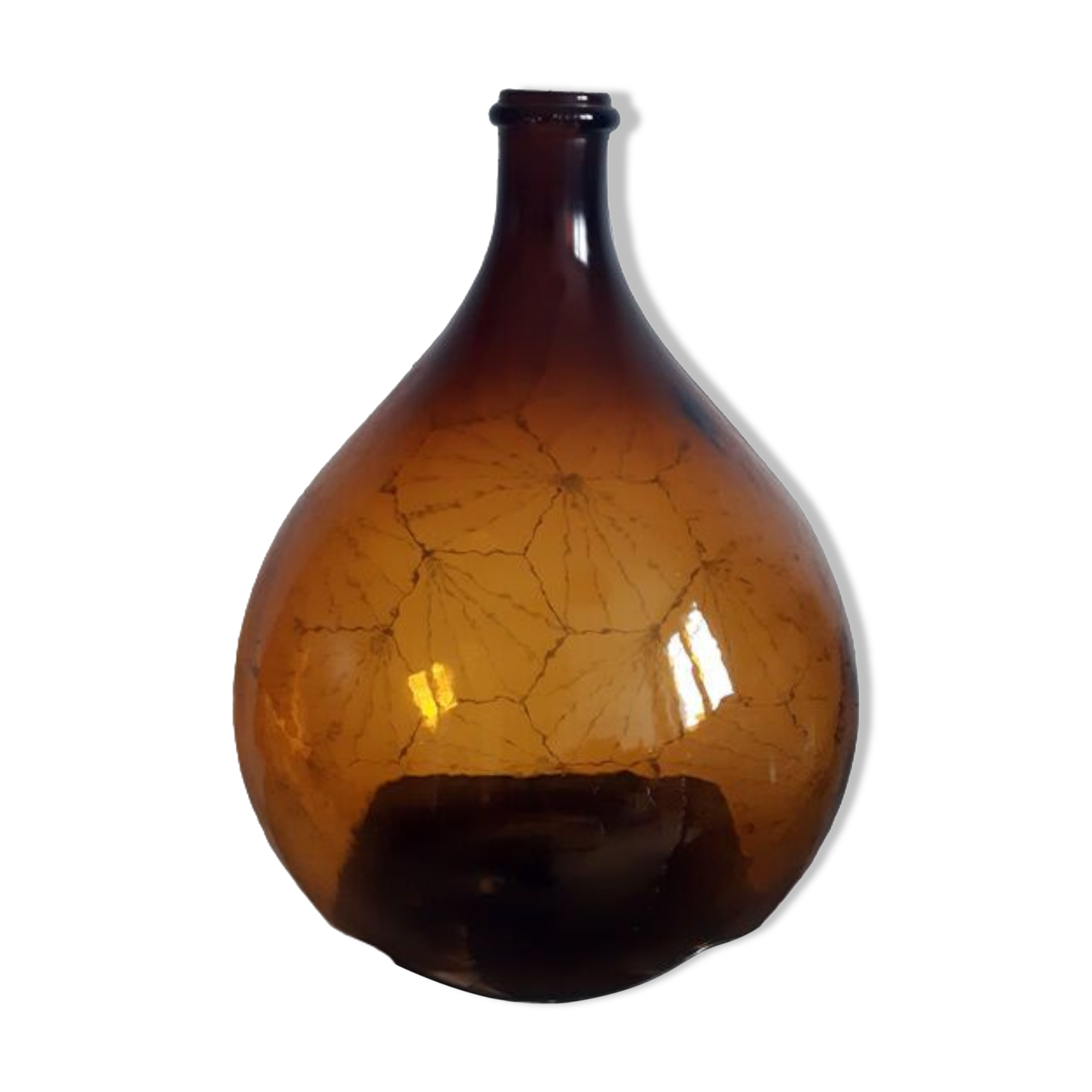 Great old demijohn in amber glass