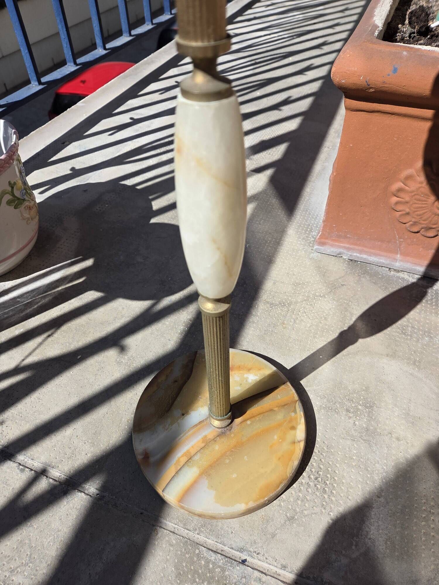 Floor ashtray in gilded brass (frieze of fish)