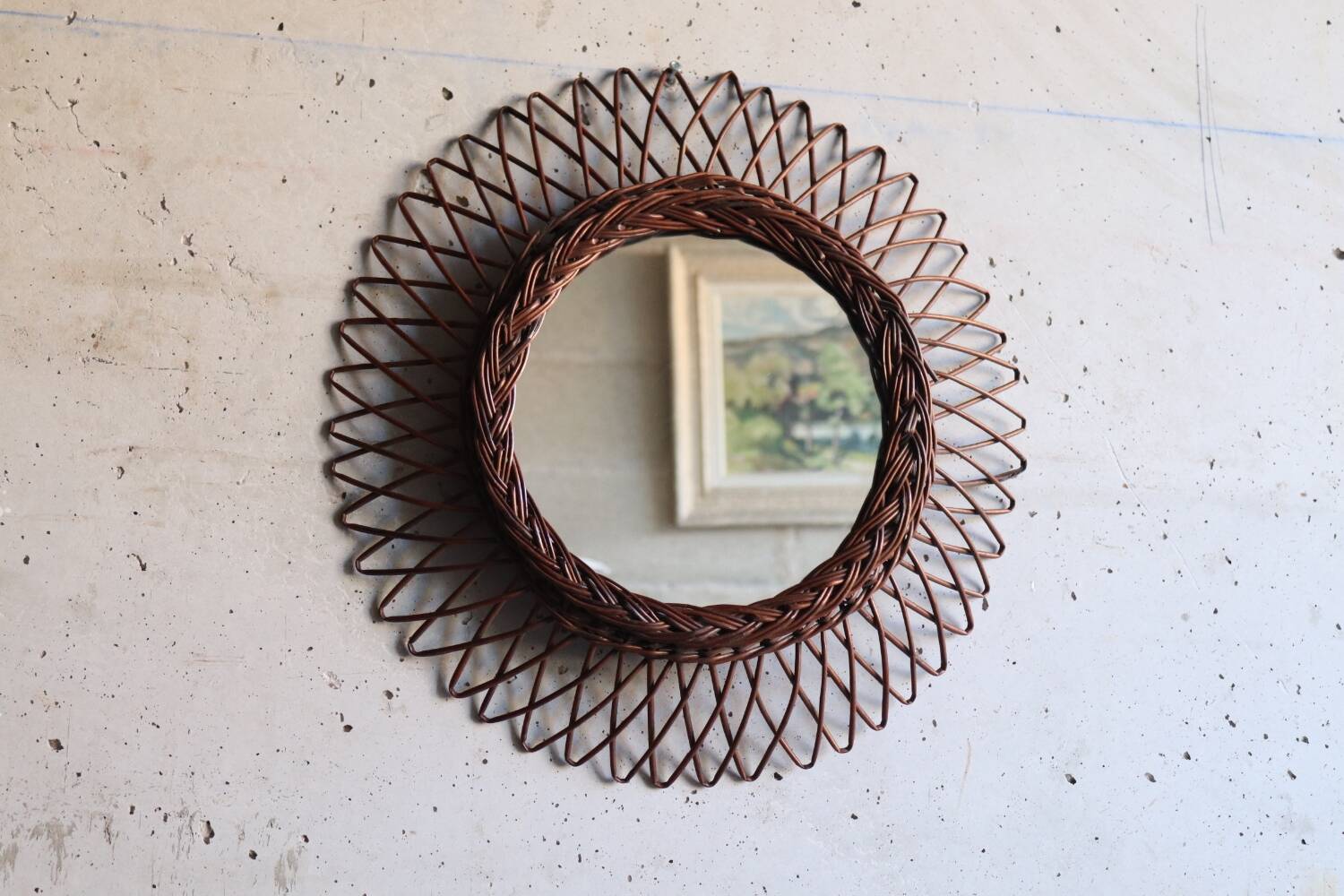 Vintage rattan sun mirror