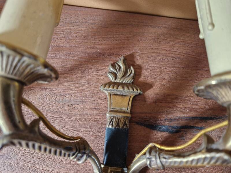 Pair of Empire-style wall sconces in gilded bronze and green lacquer.