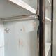Display cabinet in patinated wood
