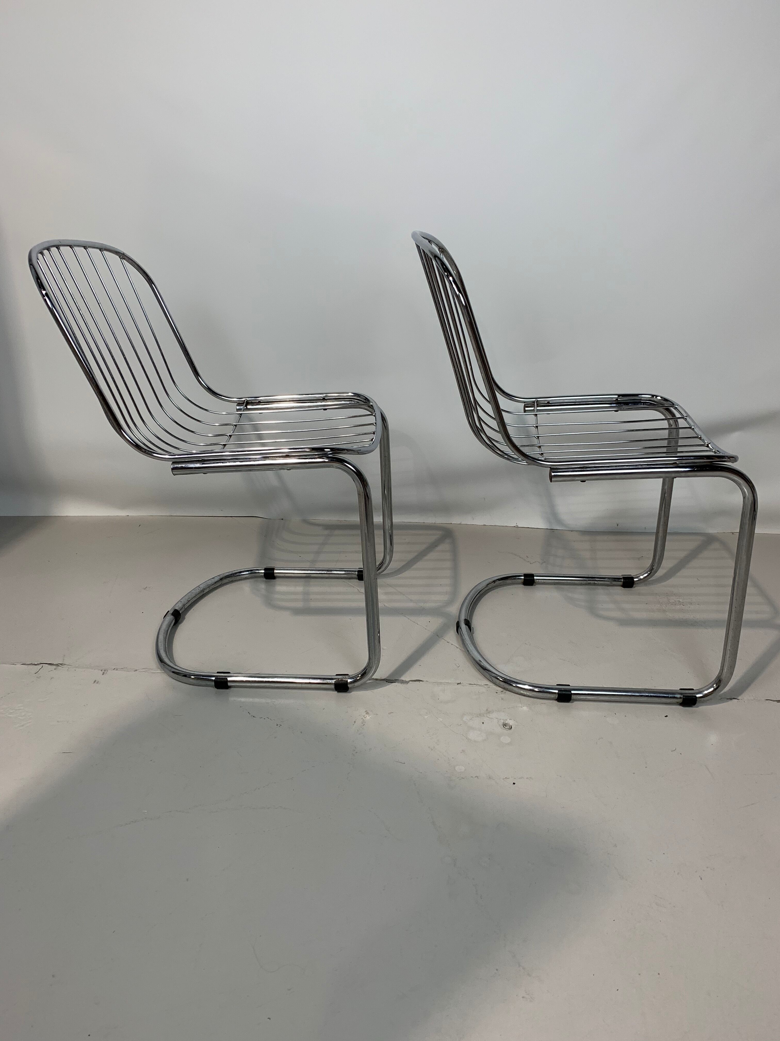 Pair of chairs by Gastone Rinaldi