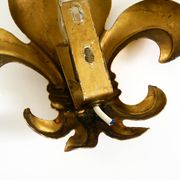 A pair of large 1970s gilt metal Fleur-de-Lis wall lamps by Hans Kögl