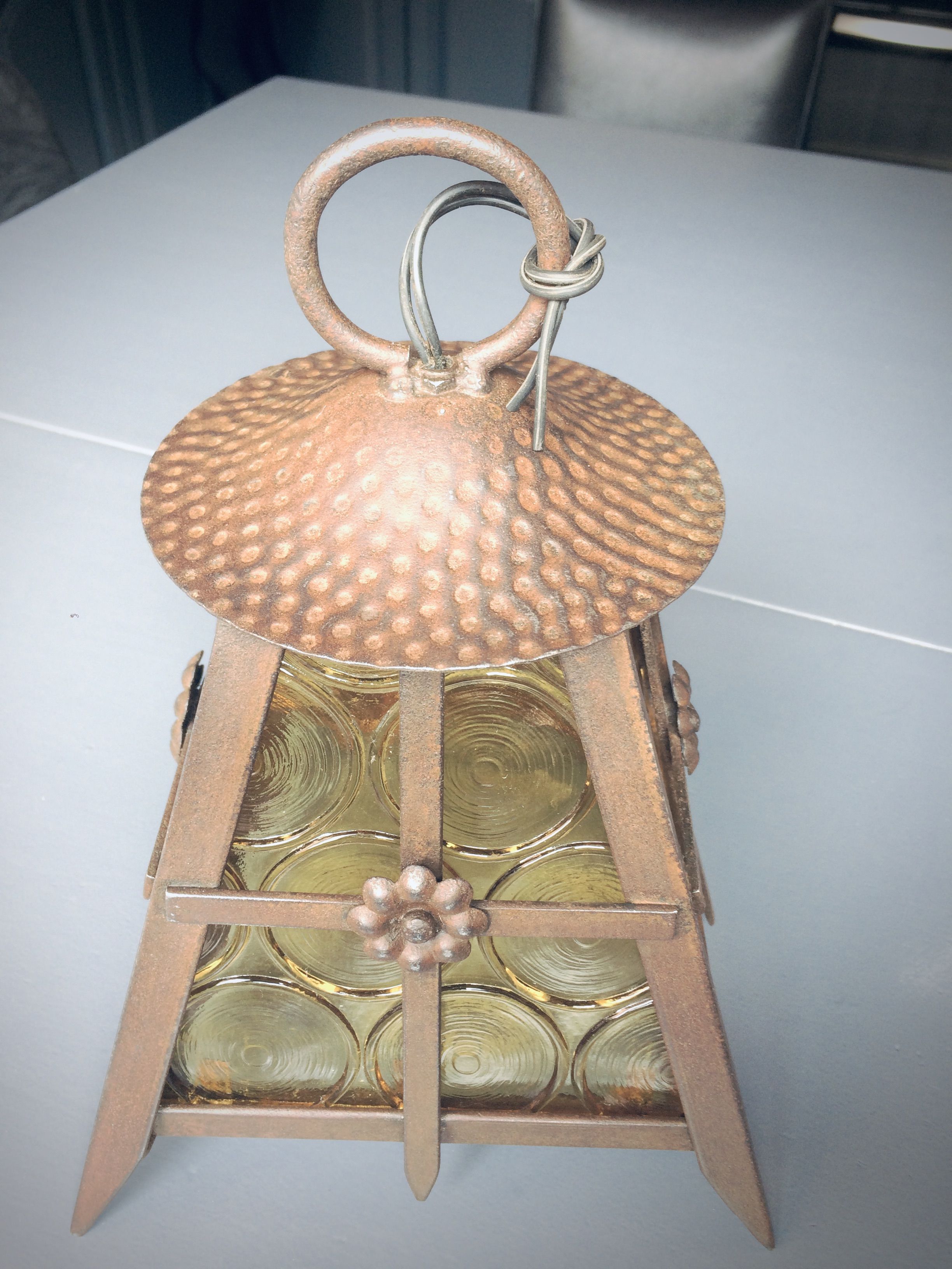 Old solid steel hanging and round-ornamented yellow glazing