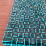 Green earthenware trivet