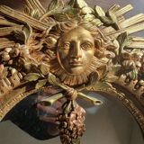 Gilded mirror signed Vincenzo Fancelli