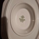 Dishes and porcelain sauceboat