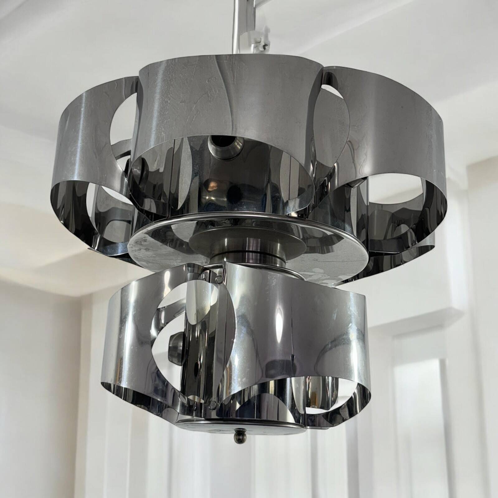 Curved steel chandelier attributed to Max Sauze, 9 lights