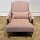 Wooden and red chevron fabric armchair with casters