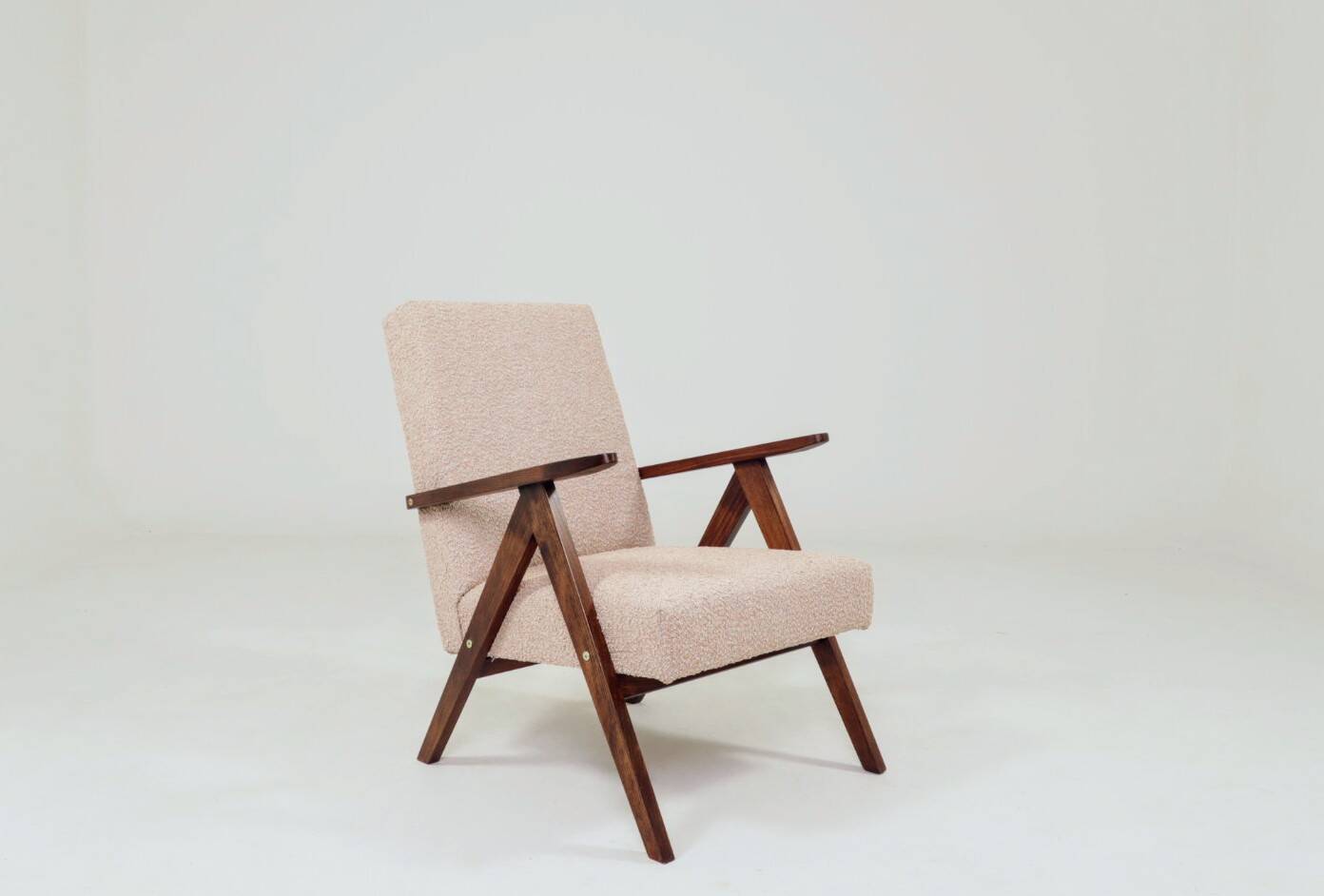 Modern powder pink boucle Zig Zag armchair