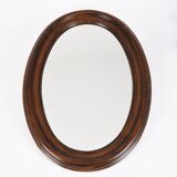 Large old oval wooden mirror