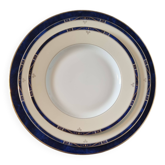 18-piece porcelain dinnerware set from Limoges by Philippe Deshoulières.