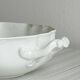 White fine porcelain soup tureen with relief decoration.