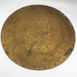 Oriental brass tray with chiseled decoration of arabesques and flowers