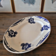 Badonviller dish model Alain, oval and round dish with blue flowers.