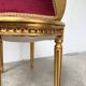 Fauteuil bois doré et velours rouge Louis XVI