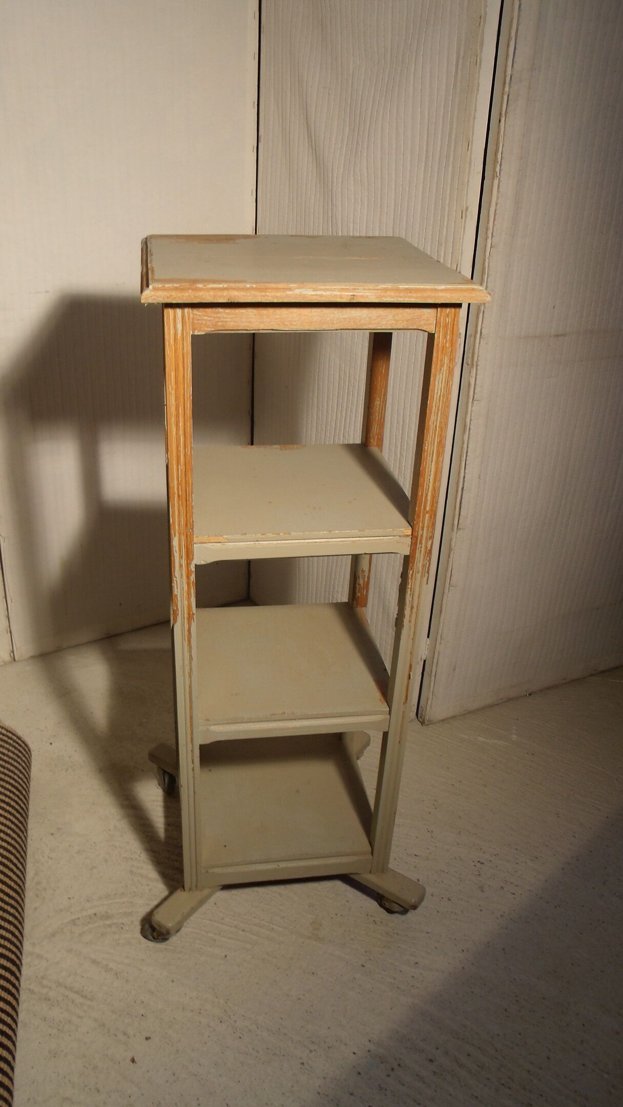 shabby wood side table on wheels
