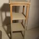 shabby wood side table on wheels