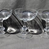 9 old champagne glasses in flat-waisted blown glass