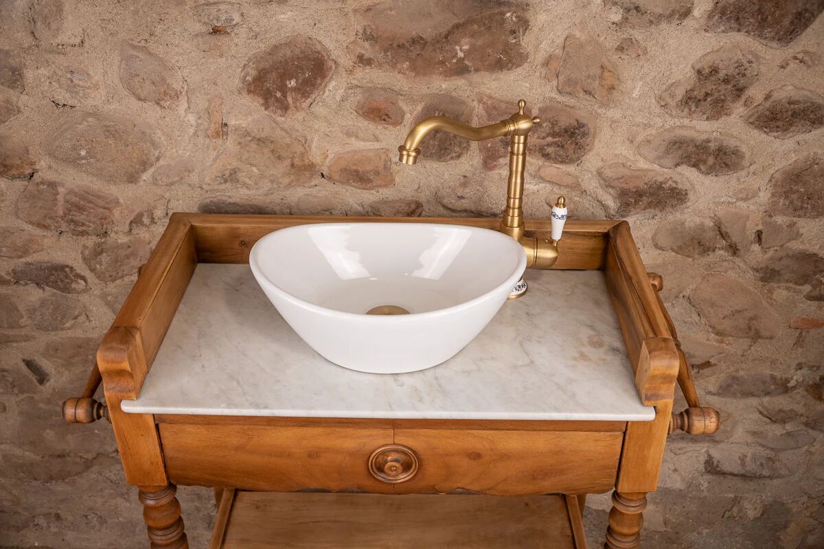 Marble and wood washbasin furniture in Louis-Philippe style.