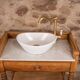 Marble and wood washbasin furniture in Louis-Philippe style.