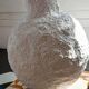 Sculptural vase with a mineral Boho spirit.