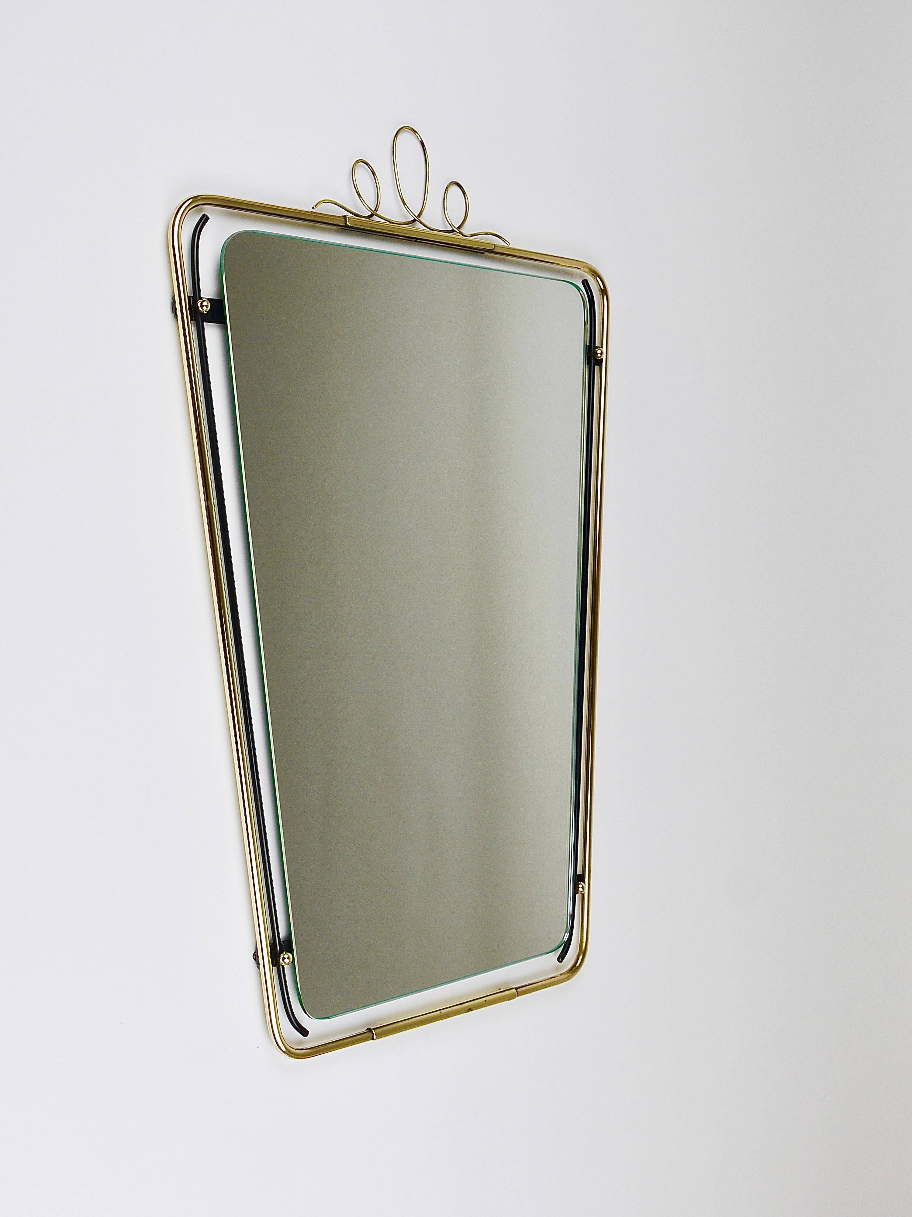 Wall mirror in brass wire with modernist loops from the mid-century, Italy, 1950s.