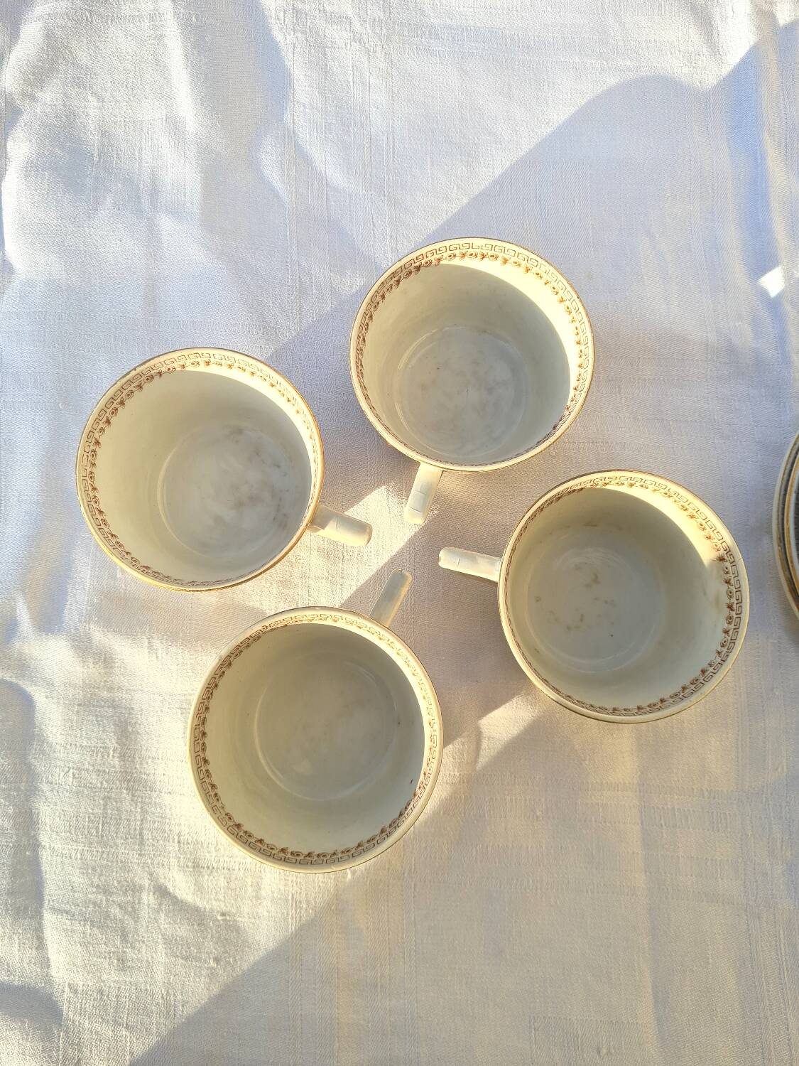 Gien opaque porcelain cups from the early 20th century