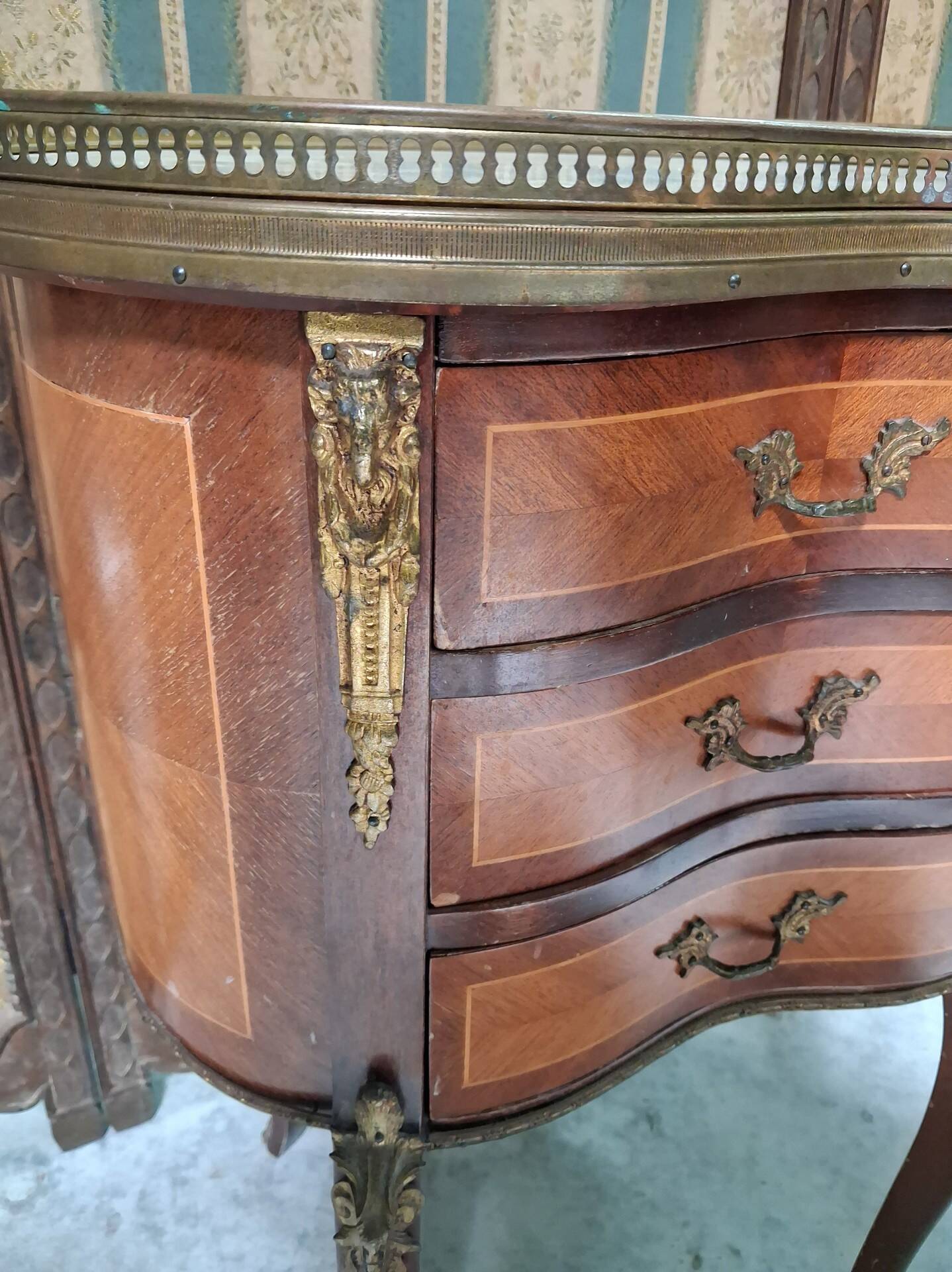 Lady's demi-lune commode in Louis XV style with marquetry and gilded bronze.