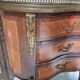 Lady's demi-lune commode in Louis XV style with marquetry and gilded bronze.