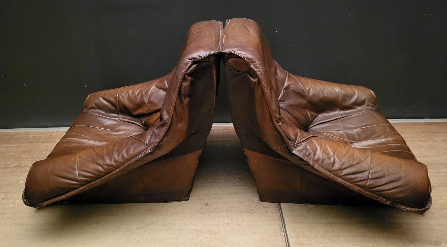 Pair of Vintage Brutalist armchairs from the 60s in leather and solid oak