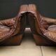 Pair of Vintage Brutalist armchairs from the 60s in leather and solid oak