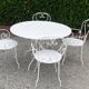 Old white wrought iron garden room