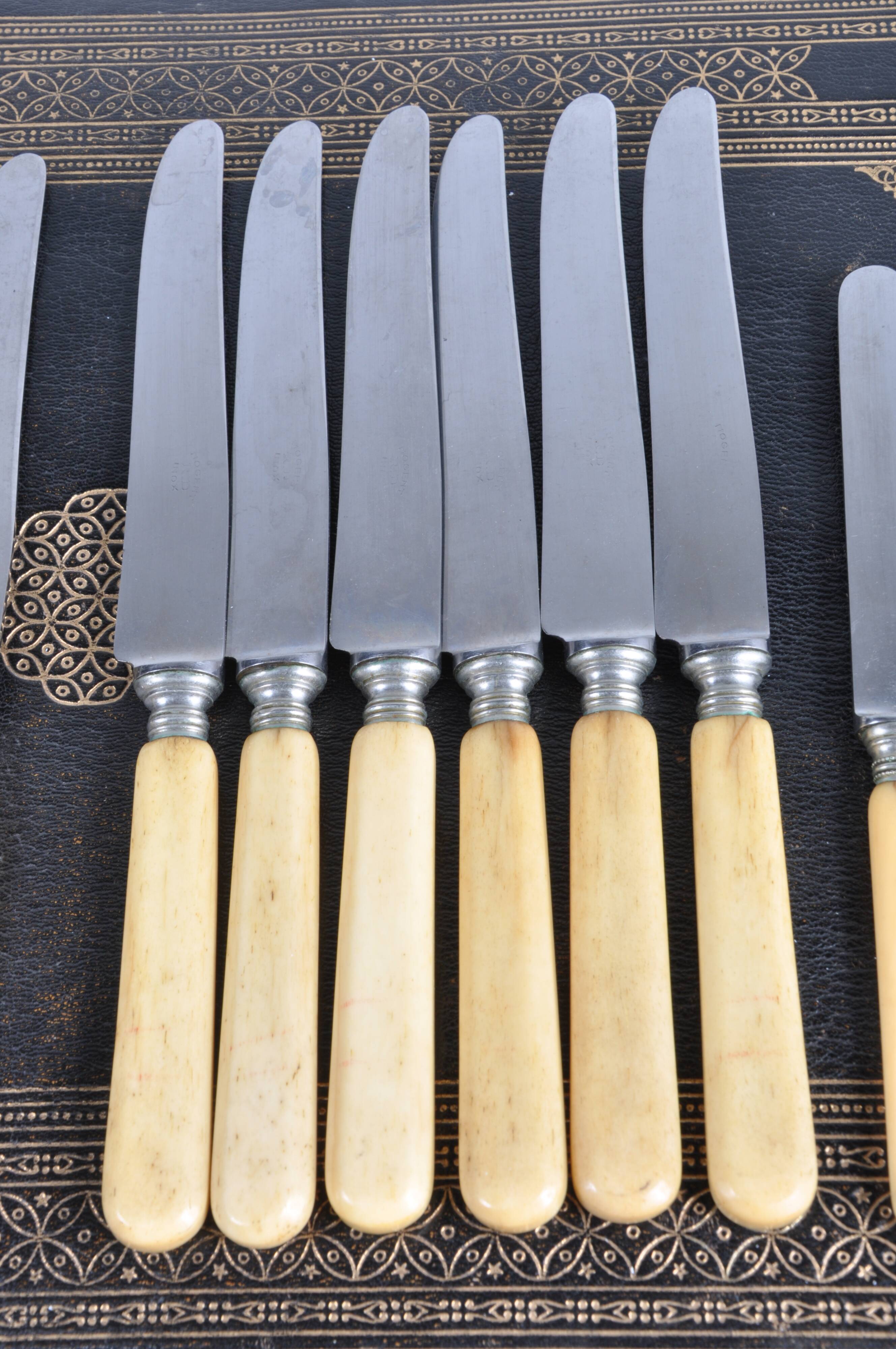 Antique knives with ivory handles.