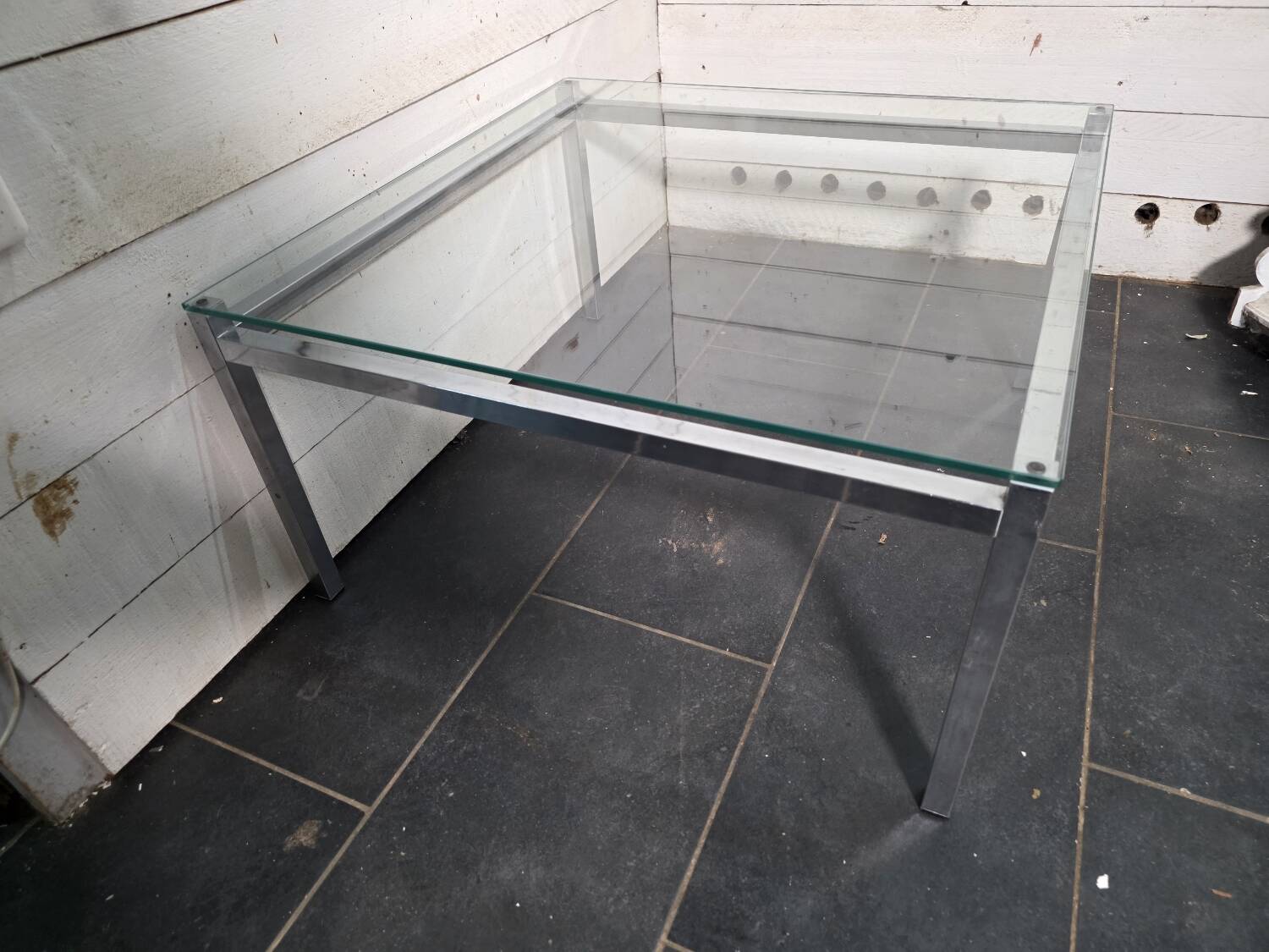 Chrome metal coffee table with a glass top from the 1970s.