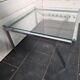 Chrome metal coffee table with a glass top from the 1970s.