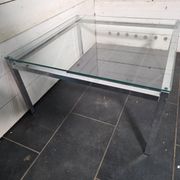 Chrome metal coffee table with a glass top from the 1970s.