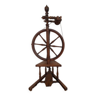 Old wooden spinning wheel