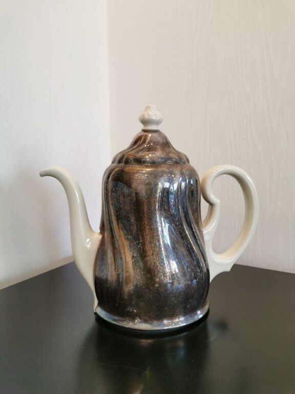 Silver-plated ceramic jug