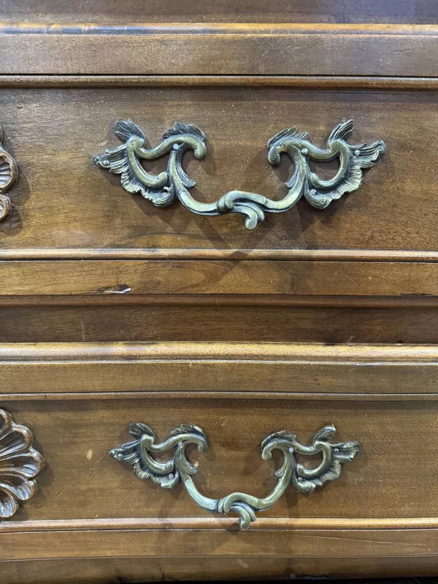 Curved commode in Louis XV style made of walnut.