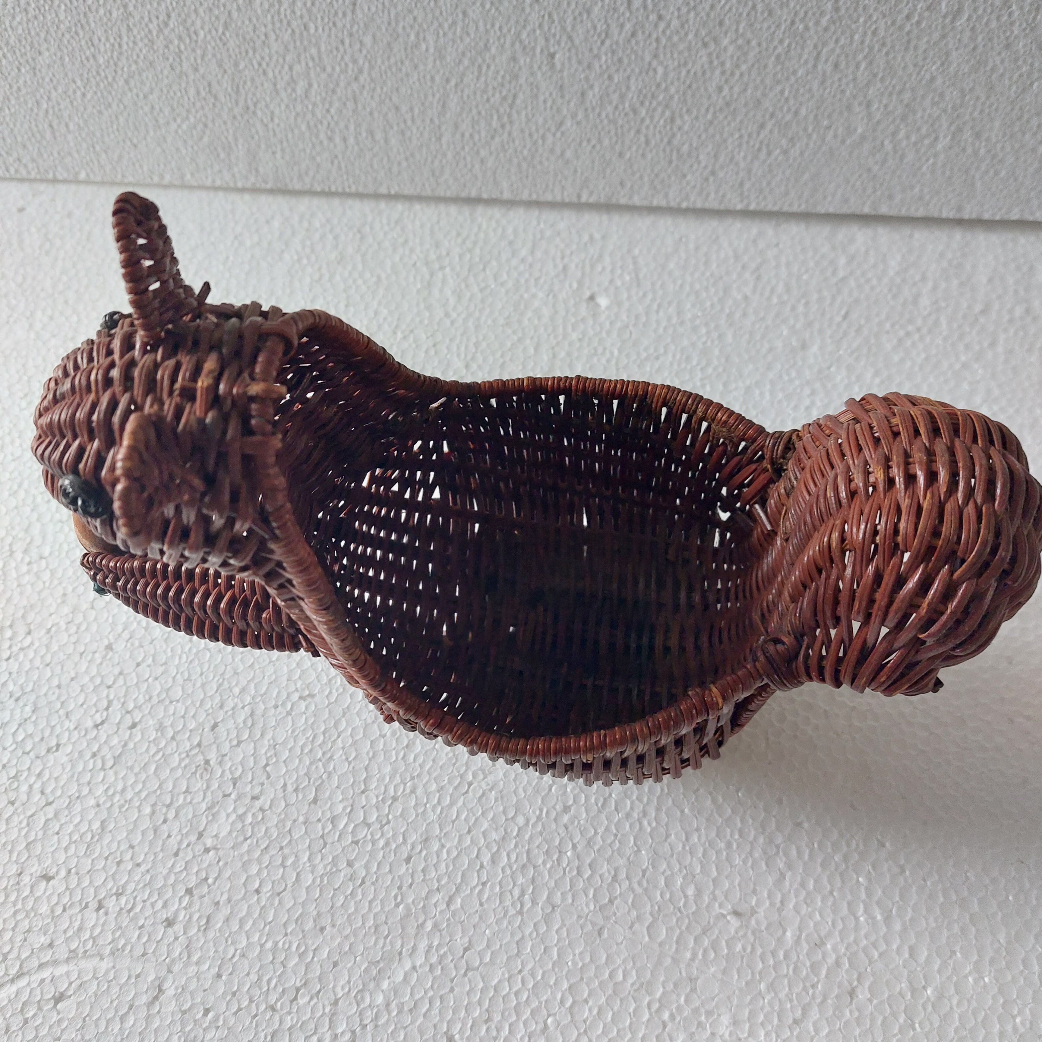 Woven wicker basket, squirrel.