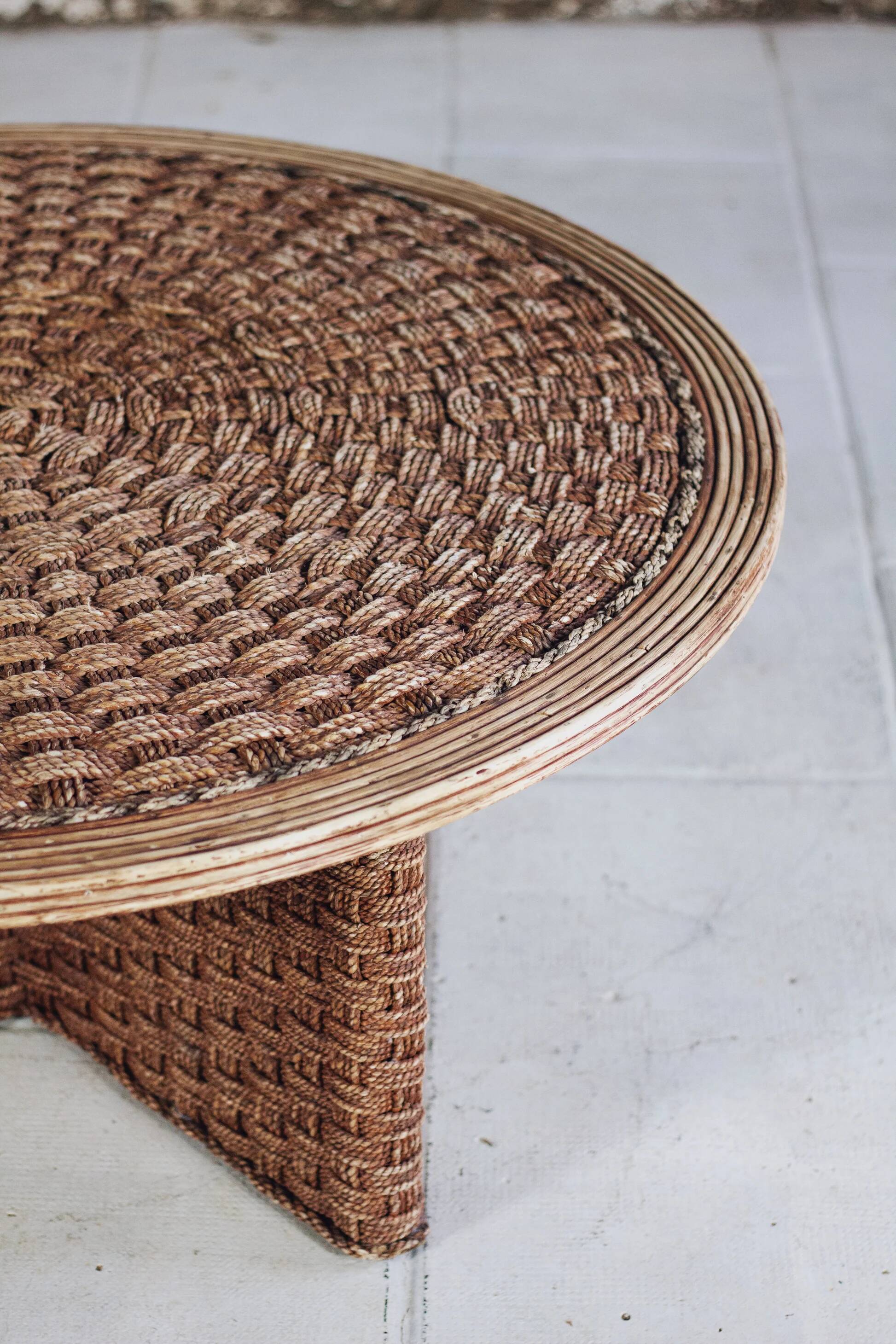 Round coffee table in braided cord and rattan, 1970.