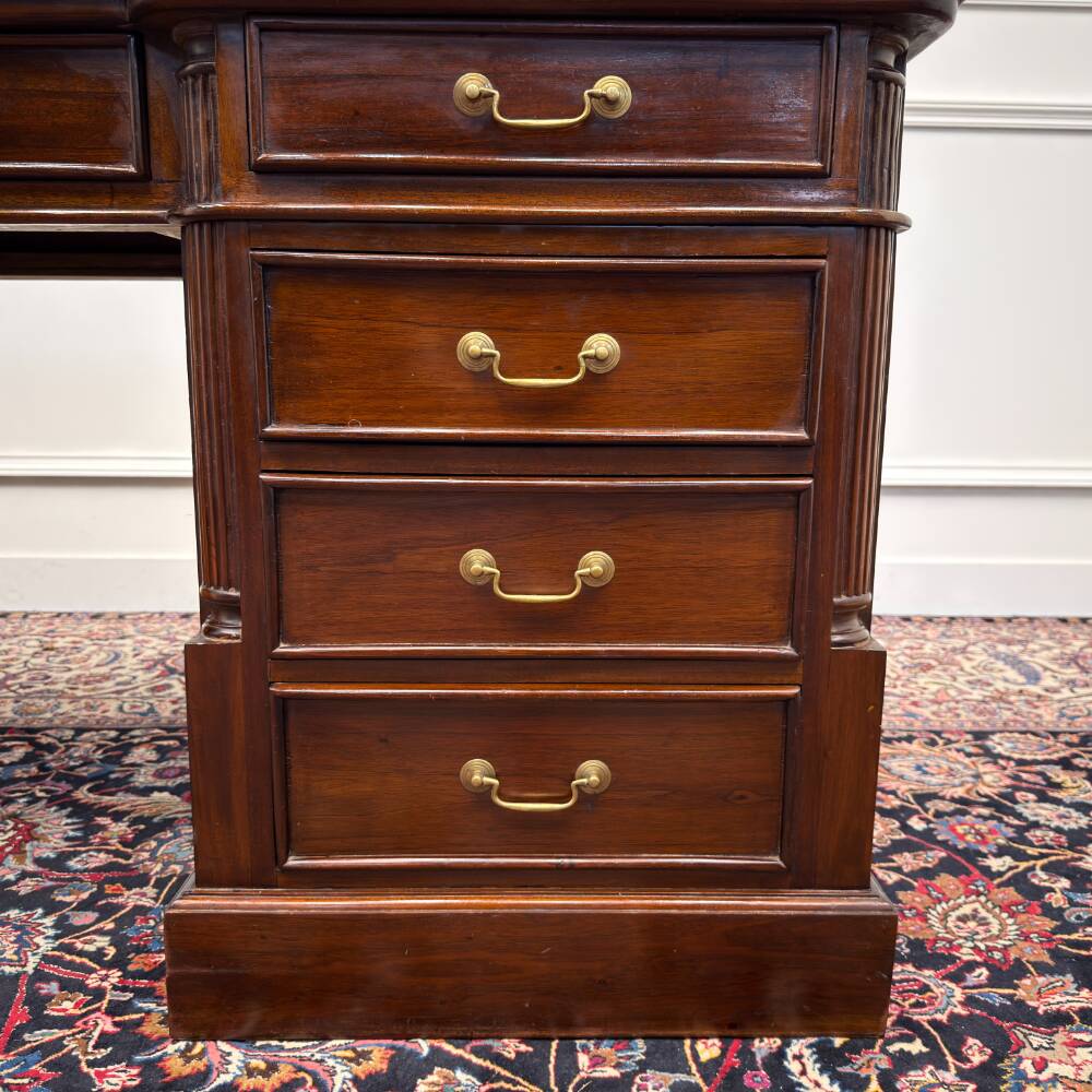 Classic English desk with green leather inlay.